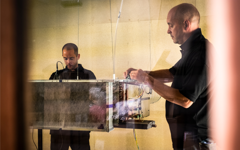 Engineers performing acoustic tests